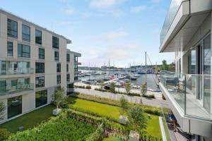 a view of a marina from a building at Wave Apartments - Yacht Park 2 in Gdynia