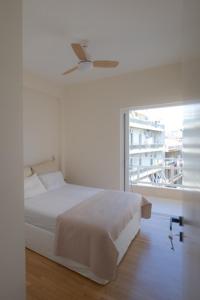 Postel nebo postele na pokoji v ubytování Harmony suite in the center of kalamata