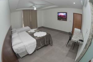 Katil atau katil-katil dalam bilik di Hotel Esmeralda Verde