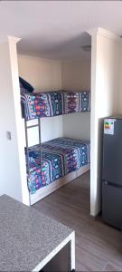 a room with two bunk beds in a room at Pucon villarrica in Pucón +22 photos