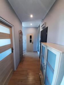 Telewizja i/lub zestaw kina domowego w obiekcie Apartament Kaszownik