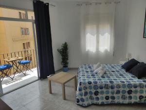 Posteľ alebo postele v izbe v ubytovaní Malaguetor Home Colón