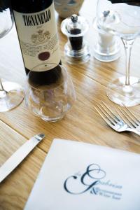 a bottle of wine sitting on top of a table at Hotel Villa Gabrisa in Positano