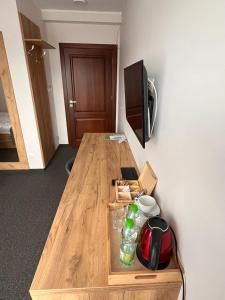 Telewizja i/lub zestaw kina domowego w obiekcie Willa WIKTORIA