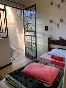 Postel nebo postele na pokoji v ubytování Cantinho Agradável em Ouro Preto