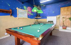 a billiard room with a pool table in it at Chatka U Hazy - Regionalne Pokoje Zakopane in Zakopane