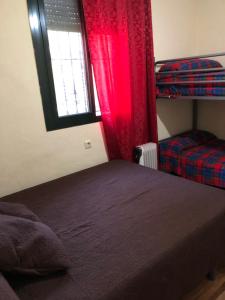 Łóżko lub łóżka w pokoju w obiekcie Casa rural en Constantina