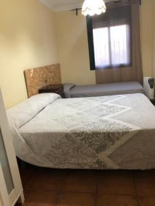 Łóżko lub łóżka w pokoju w obiekcie Casa rural en Constantina