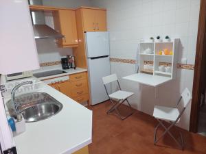 Kuchyňa alebo kuchynka v ubytovaní Ático Vacacional Manzanilla