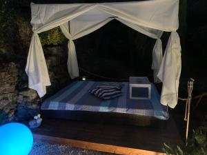 Postel nebo postele na pokoji v ubytování IL PICCOLO PARADISO