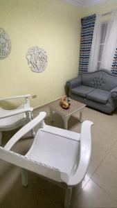 Coin salon dans l'établissement L&Y Punta Cana Beach Apartament