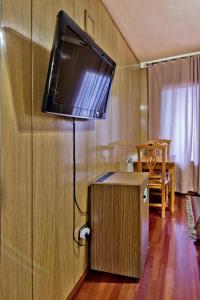 TV a/nebo společenská místnost v ubytování Hotel Doña Blanca