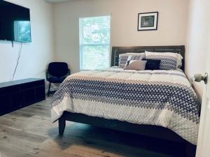 Ein Bett oder Betten in einem Zimmer der Unterkunft Leny's Place