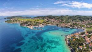 an aerial view of a small island in the water at Apartments and rooms by the sea Lumbarda, Korcula - 9272 in Lumbarda