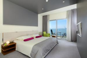 Krevet ili kreveti u jedinici u okviru objekta Hotel Split