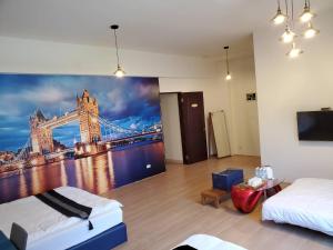 Postel nebo postele na pokoji v ubytování Jin Du Yi Yuan B & B
