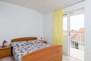 Postel nebo postele na pokoji v ubytování Apartments with parking spaces Orebic, Peljesac - 643