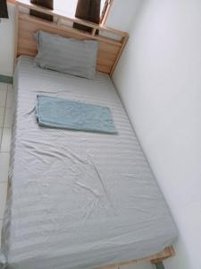 Ένα ή περισσότερα κρεβάτια σε δωμάτιο στο 5บีบี 5BB guest house