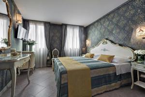 Voodi või voodid majutusasutuse Antica Locanda al Gambero toas