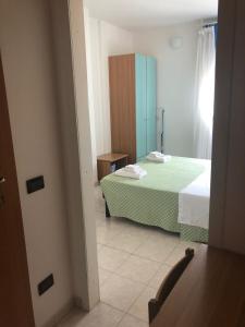 Posteľ alebo postele v izbe v ubytovaní Hotel Atlantic