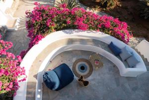 an overhead view of a garden with pink flowers at KAMEO, Antiparos in Antiparos