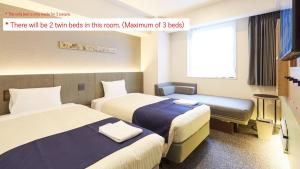 hotel MONday Premium Ueno Okachimachi房間的床