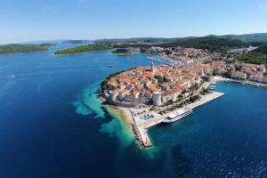 an aerial view of a small island in the water at Double Room Korcula 4356c in Korčula +9 photos