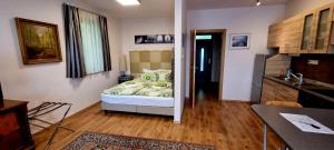 A bed or beds in a room at Sofia Apartment Kázmér