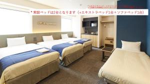hotel MONday Premium Ueno Okachimachi房間的床