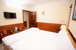 TV a/nebo společenská místnost v ubytování Amazing Hotel, Trương Pháp, Quang Phú, Đồng Hới + 37 fotografií