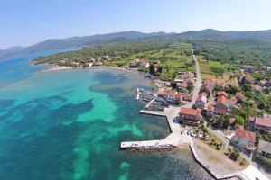 an aerial view of a small island in the water at Apartments by the sea Sreser, Peljesac - 4557 in Janjina