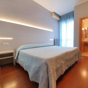 Postel nebo postele na pokoji v ubytování Air Hotel