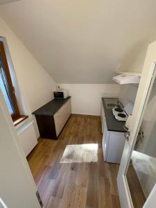Kuchyňa alebo kuchynka v ubytovaní Kersko Apartments