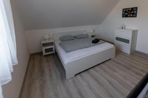 Letto o letti in una camera di Olivér 22 Apartman