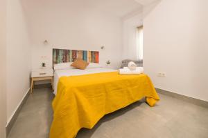 Posteľ alebo postele v izbe v ubytovaní Apartamento Ribera del Genil Centro