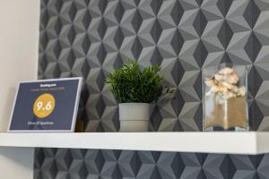 Certificato, attestato, insegna o altro documento esposto da Olivér 22 Apartman
