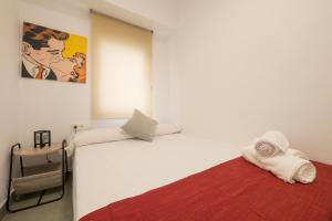 Posteľ alebo postele v izbe v ubytovaní Apartamento Ribera del Genil Centro