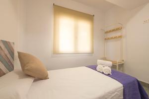 Posteľ alebo postele v izbe v ubytovaní Apartamento Ribera del Genil Centro
