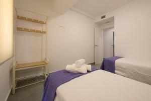 Posteľ alebo postele v izbe v ubytovaní Apartamento Ribera del Genil Centro
