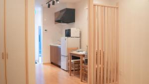 Μια τηλεόραση ή/και κέντρο ψυχαγωγίας στο HANASTAY花渓居 · 松（MATSU)