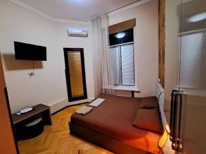 TV a/nebo společenská místnost v ubytování Liza's home