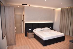 Postel nebo postele na pokoji v ubytování Hotel Continental