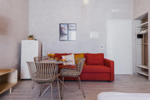 A seating area at Five Stars Sicily by Ortigia Apartments