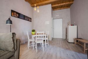A kitchen or kitchenette at Five Stars Sicily by Ortigia Apartments