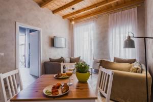 A seating area at Five Stars Sicily by Ortigia Apartments