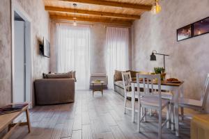 A seating area at Five Stars Sicily by Ortigia Apartments