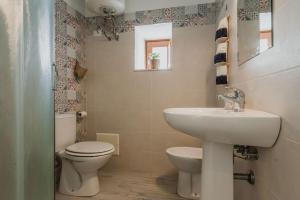A bathroom at Five Stars Sicily by Ortigia Apartments