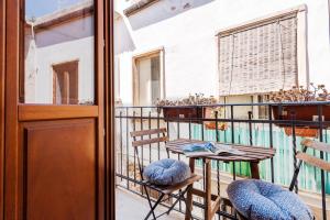 A balcony or terrace at Five Stars Sicily by Ortigia Apartments