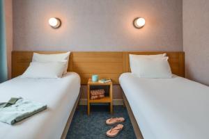 Postel nebo postele na pokoji v ubytování Sure Hotel by Best Western Centre Beaune