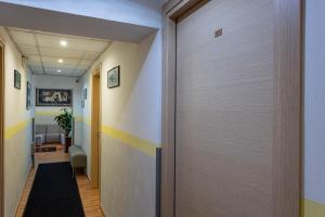 Postel nebo postele na pokoji v ubytování Hotel La Quercia